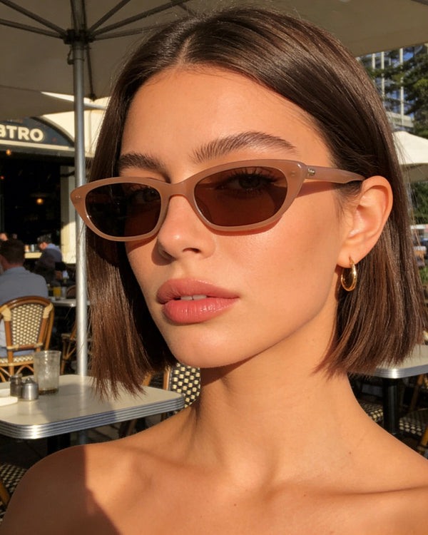Pink Baby The Indie cinnamon sunglasses with rounded frames and tinted lenses, stylish and comfortable for everyday wear.