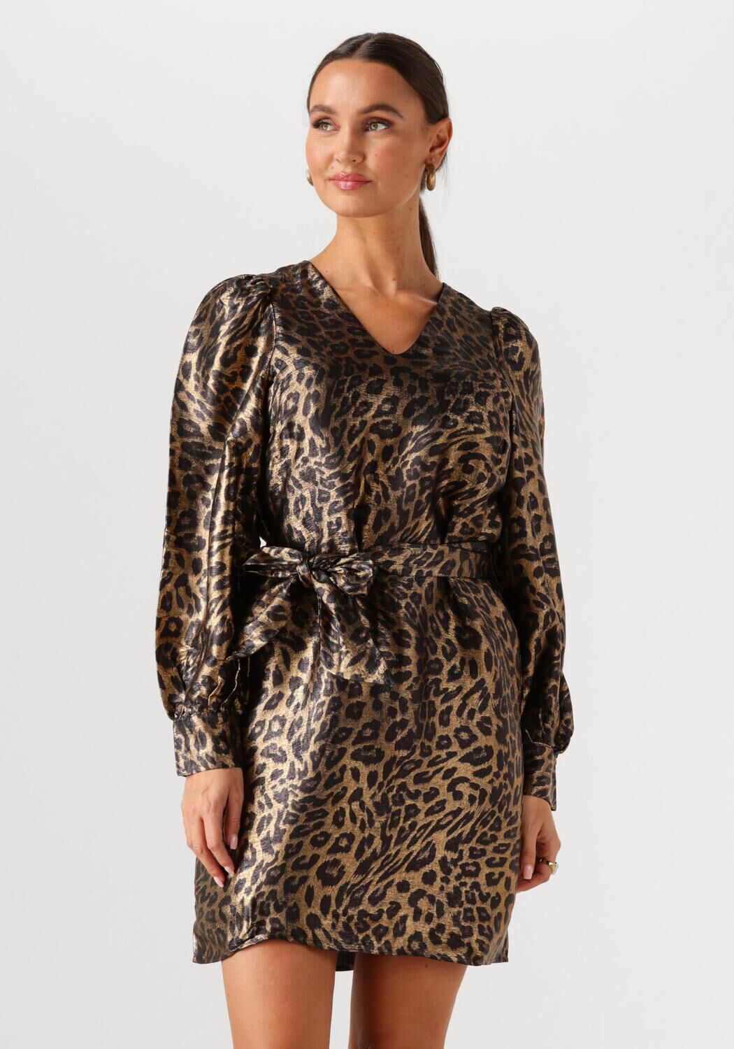 Pink Baby Leona Luxe Leopard Wrap Mini Dress in gold brown with animal print and wrap design, styled for a chic look.