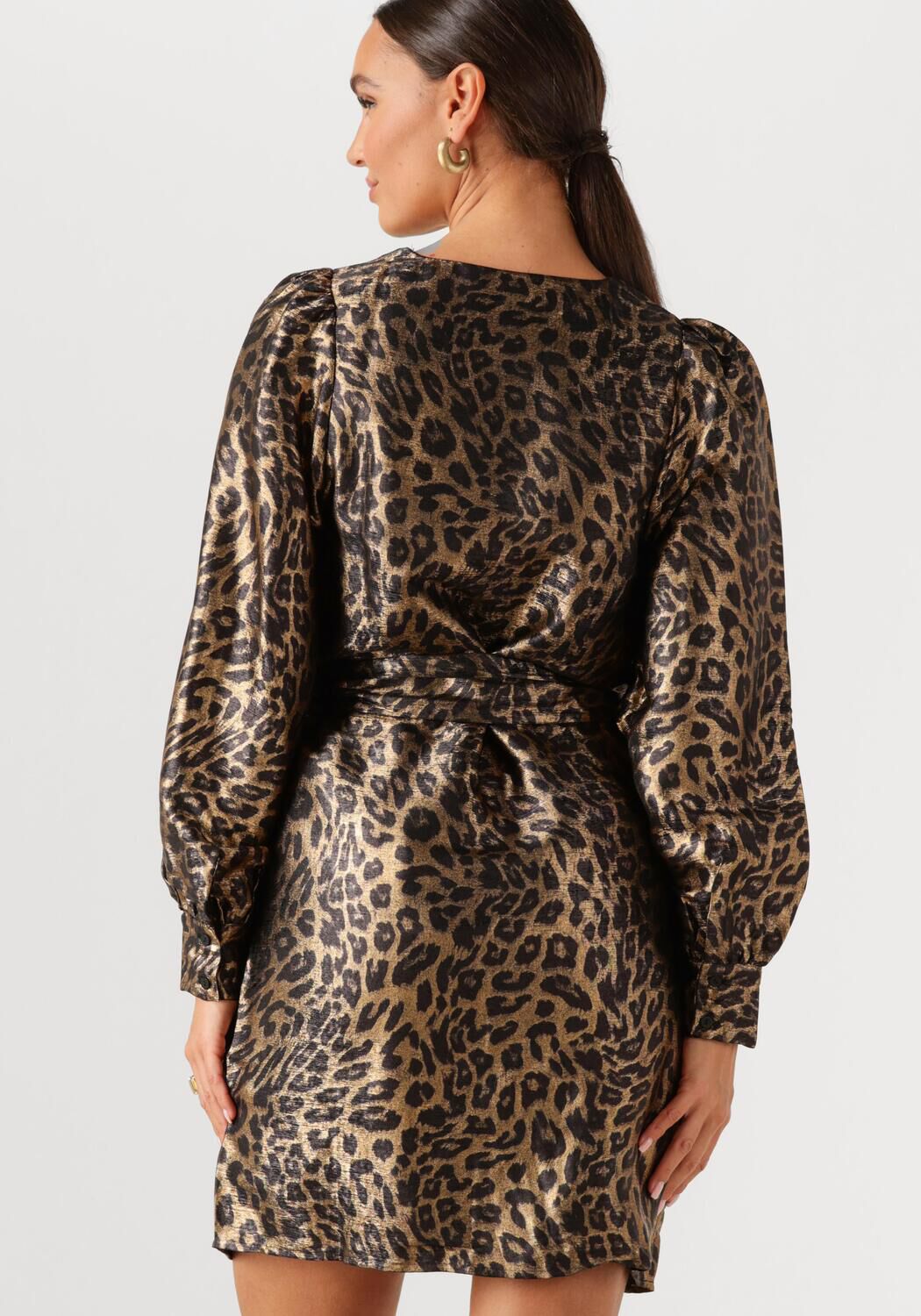 Pink Baby Leona Luxe Leopard Wrap Mini Dress in gold brown with leopard print fabric, stylish and fitted for a chic look.