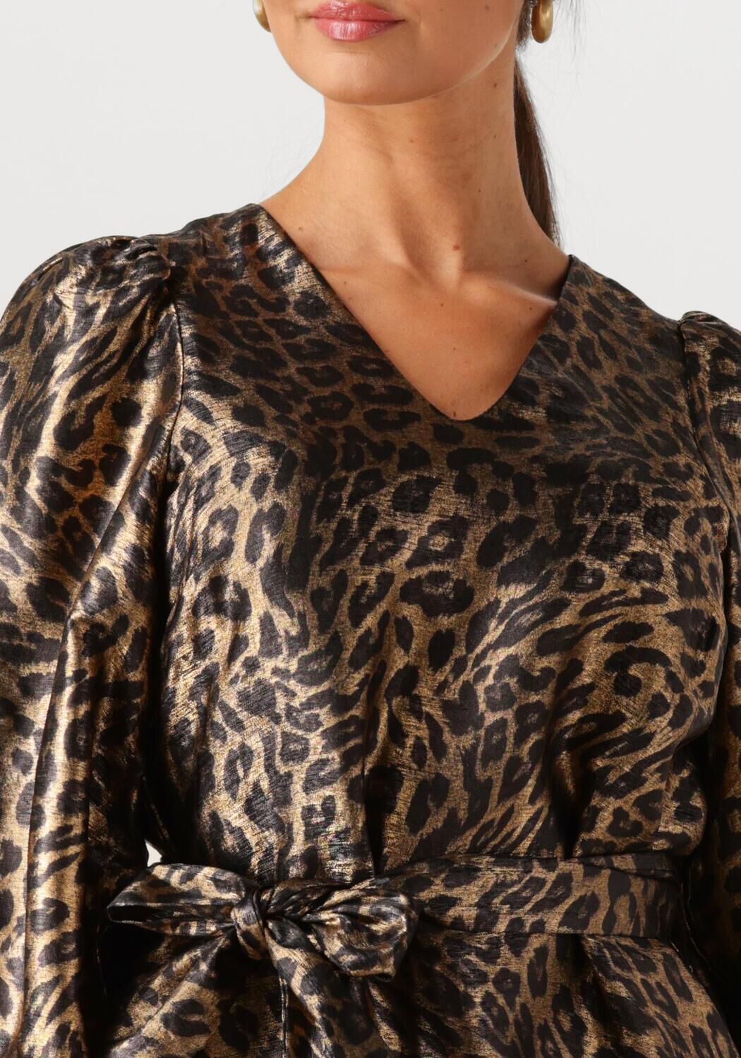 Pink Baby Leona Luxe Leopard Wrap Mini Dress in gold brown featuring a stylish leopard print and a flattering wrap design.
