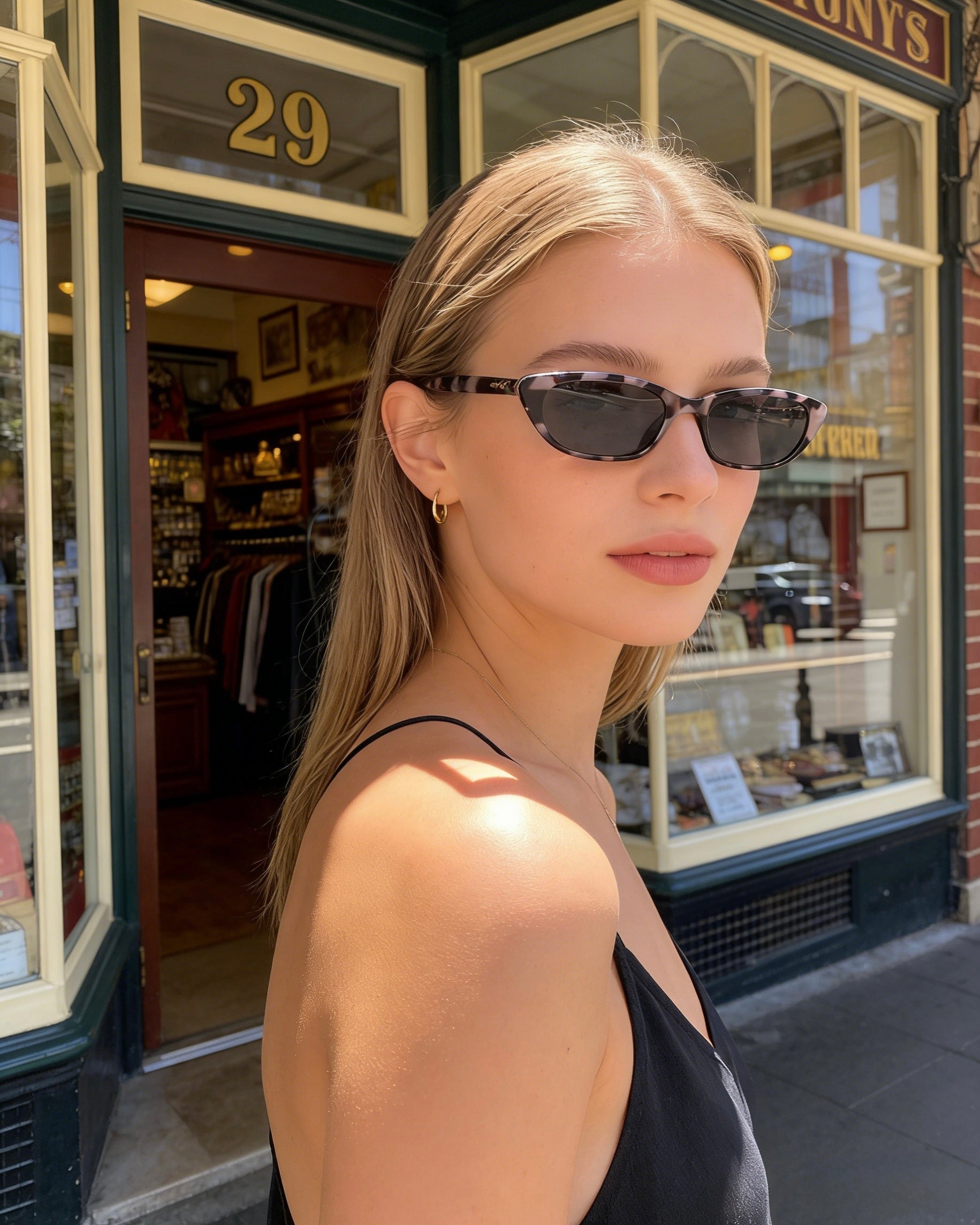 Pink Baby The Indie smoky sunglasses with rounded frames and tinted lenses, stylish and trendy for everyday wear.