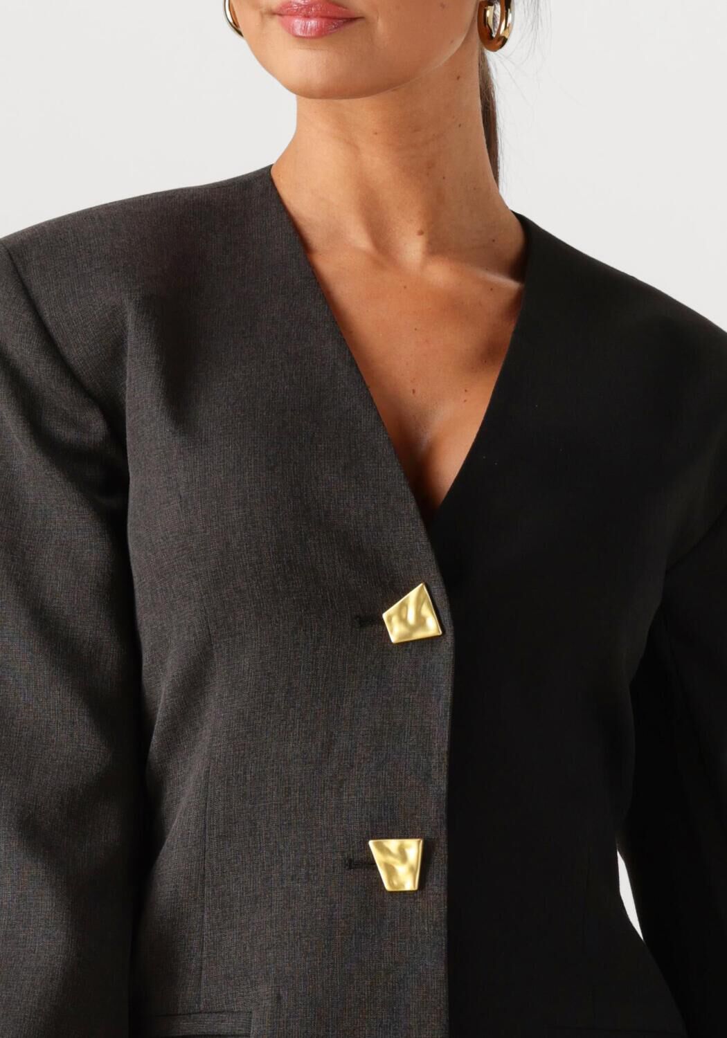 Charcoal black Marcella gold-button tailored mini dress by Pink Baby, shown on a hanger with detailed fabric texture.