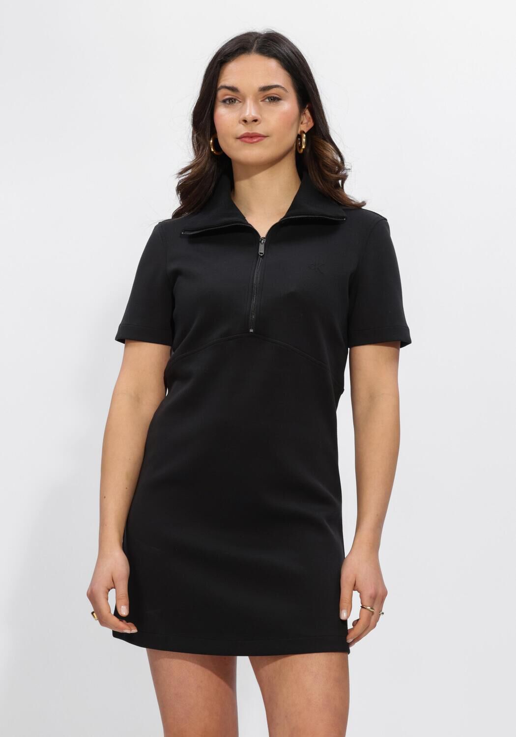 Black Bianca Zip-Collar Mini Dress by Pink Baby featuring a stylish zip-up collar and fitted silhouette.