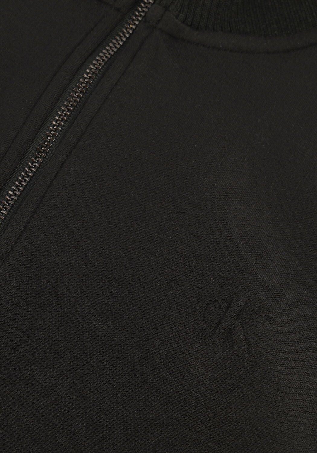 Pink Baby Bianca zip-collar mini dress in black, shown with close-up of zipper detail and fitted silhouette.