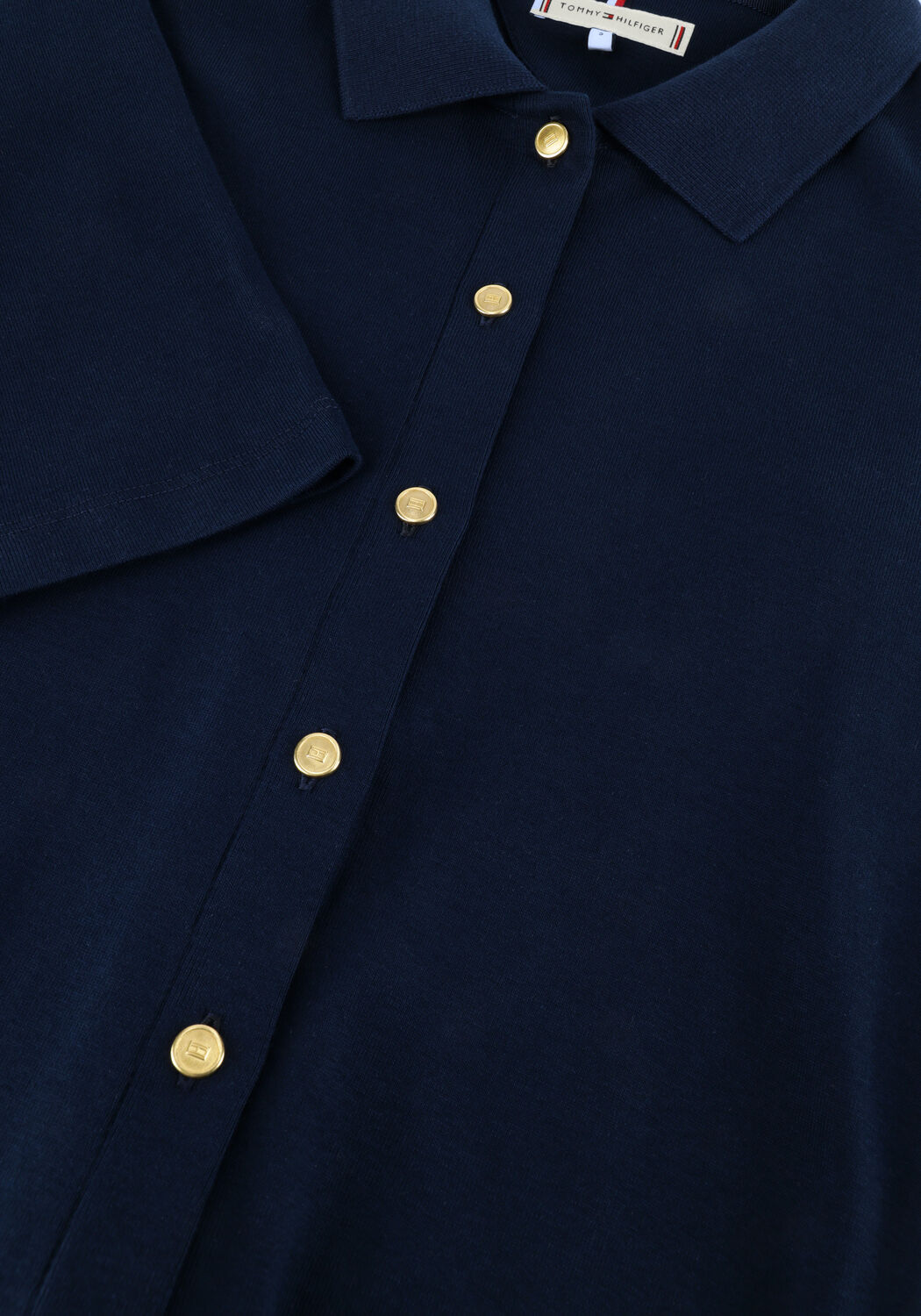 Pink Baby Lucia button-front collared midi dress in navy, featuring a stylish collar and flowing length on a model.