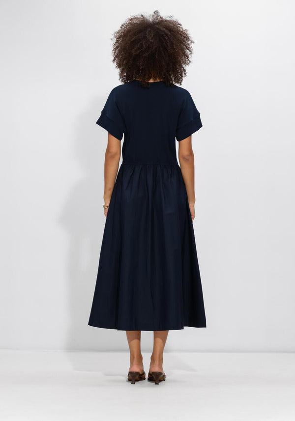 Pink Baby Allegra gathered midi dress in midnight navy, featuring a stylish design with gathered details and a midi length.