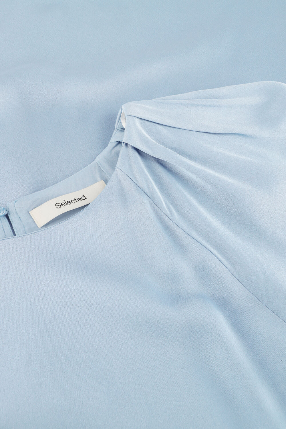 Pink Baby Evelina Draped Balloon-Sleeve Mini Dress in dusty blue, showcasing a stylish mini dress with flowing fabric and balloon sleeves.
