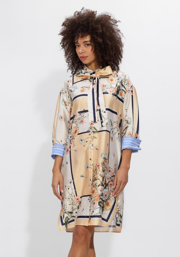 Pink Baby Lucienne floral scarf-tie shirt dress in champagne beige, featuring a stylish and elegant floral pattern.