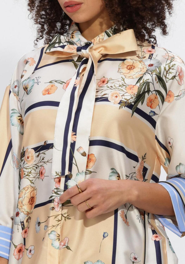Pink Baby Lucienne floral scarf-tie shirt dress in champagne beige, featuring a stylish, lightweight design and elegant floral pattern.