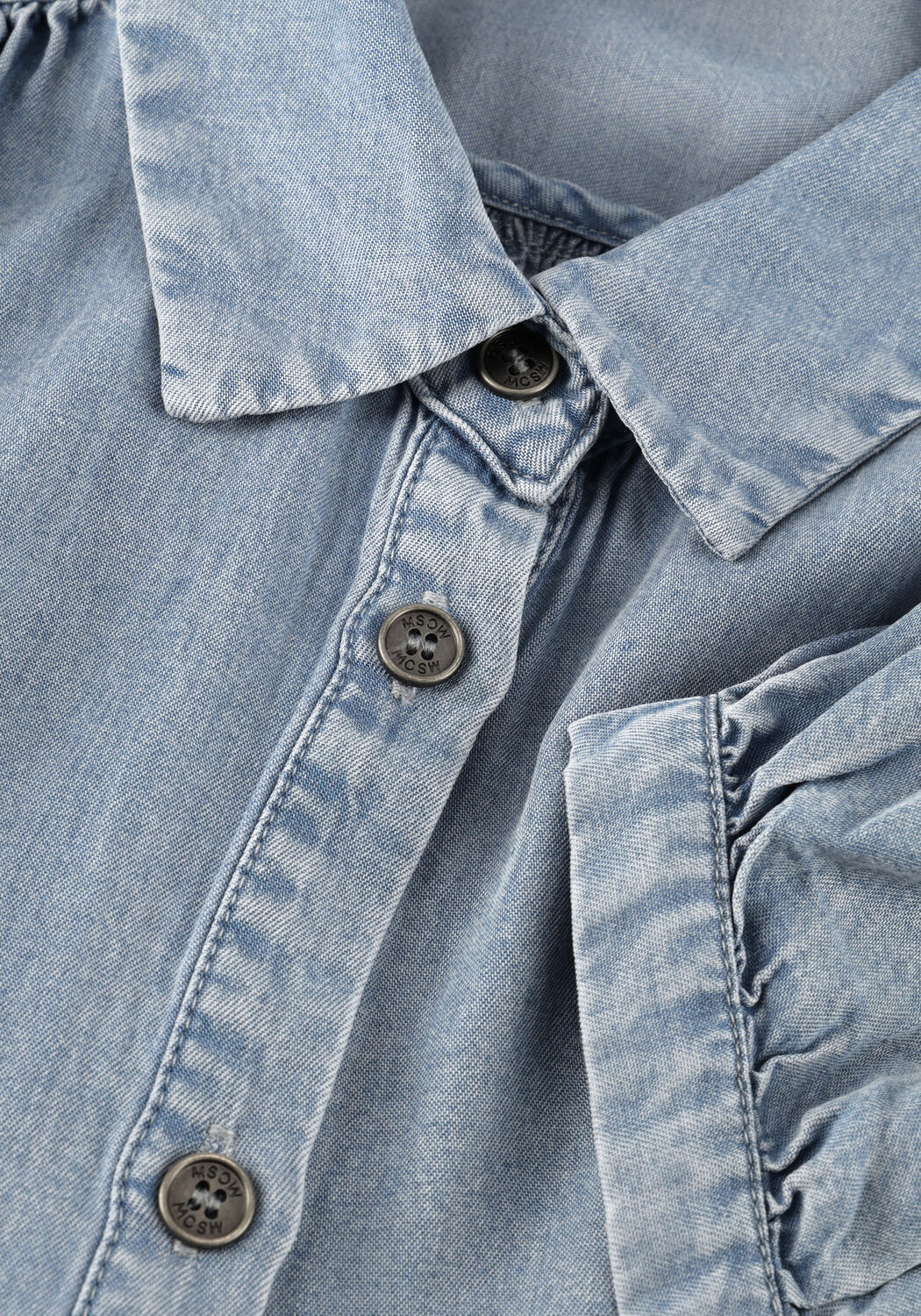 Light blue Normi denim shirt dress by Pink Baby featuring button-front design and casual fit.