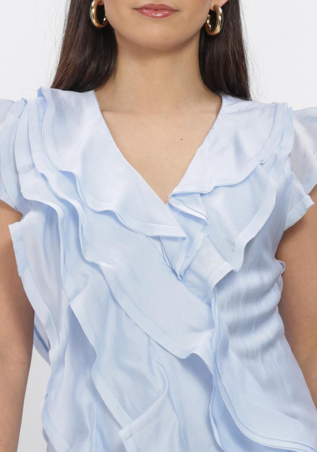 Pink Baby Diana ruffled maxi dress in soft blue, flowing fabric with ruffle details, perfect for elegant summer occasions.