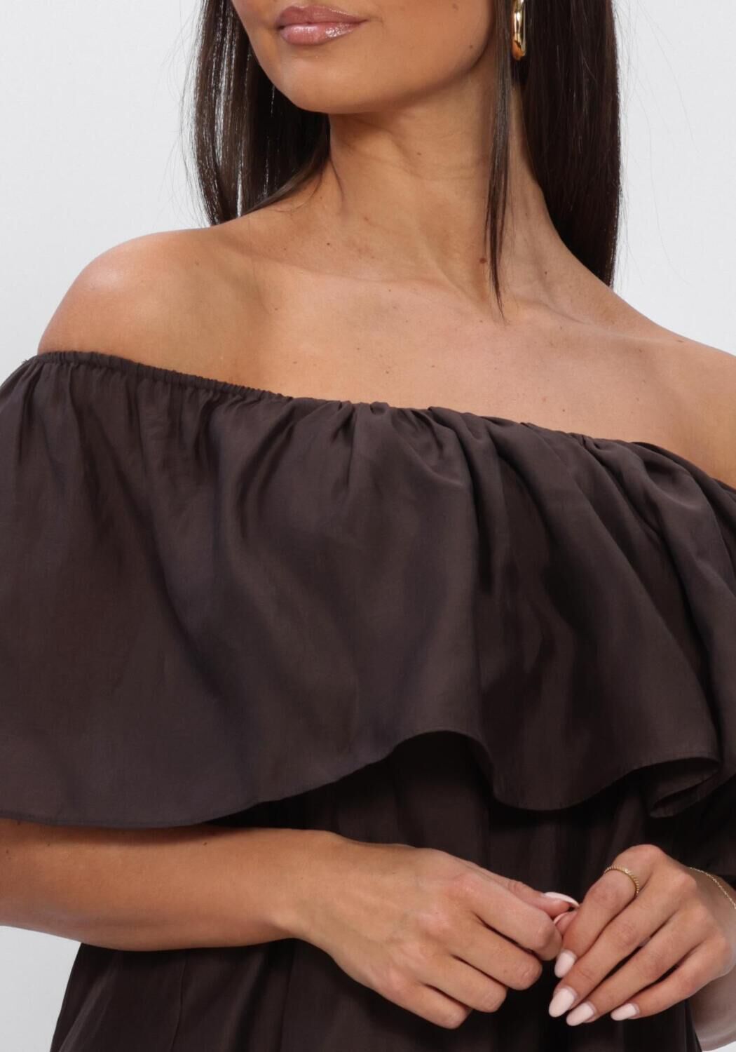 Pink Baby Serafina off-shoulder ruffle maxi dress in espresso brown, flowing fabric with layered ruffles and off-shoulder design.
