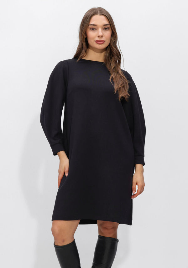 Black Helena long-sleeve shift dress by Pink Baby, shown on a hanger with a simple, elegant design and round neckline.