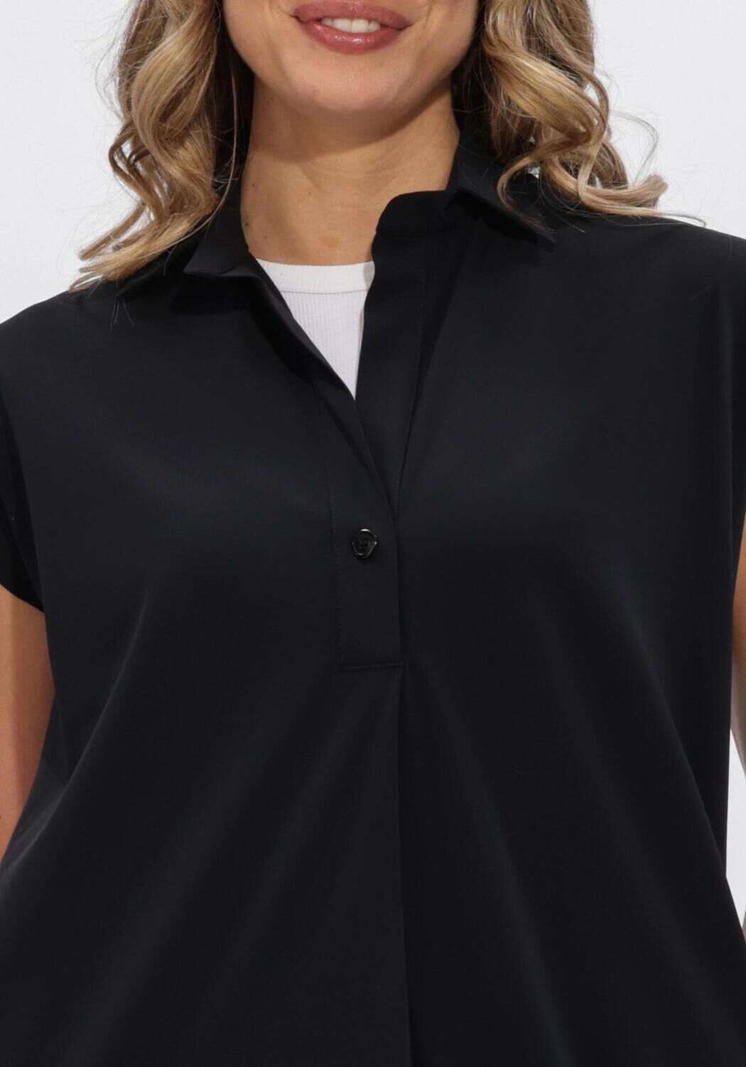 Pink Baby Alexa Relaxed Polo Midi Dress in black, with a comfortable fit and polo collar, displayed on a mannequin.