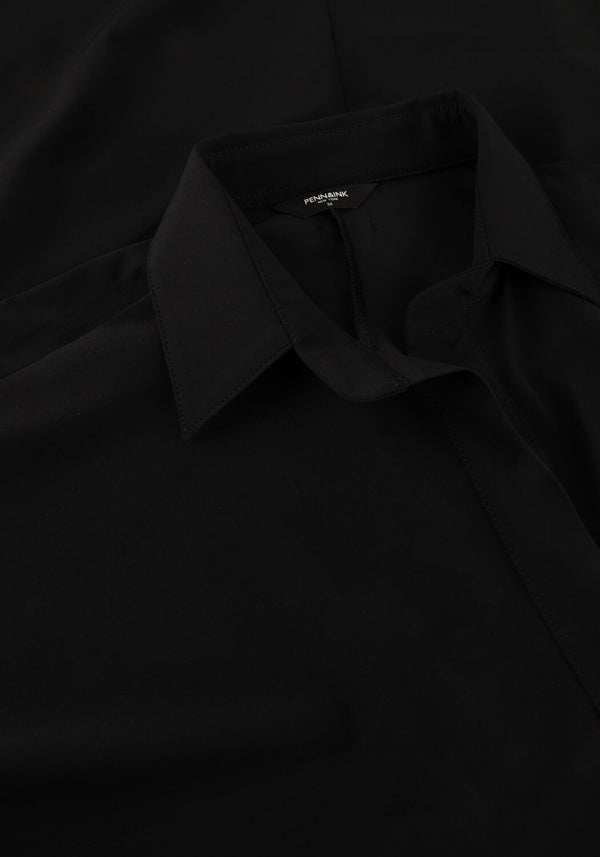 Pink Baby Alexa relaxed polo midi dress in black, featuring a comfortable fit and classic polo collar, shown on a model.
