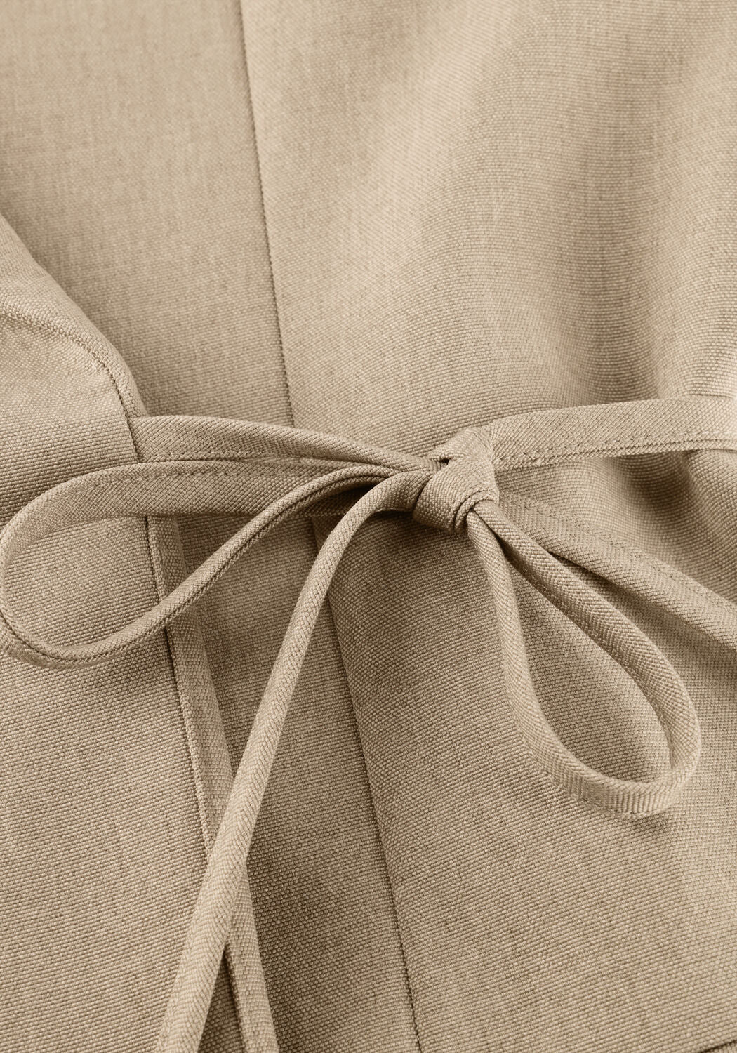 Pink Baby Amarie tailored wrap blazer mini dress in taupe, featuring a fitted waist and sleek design on a model.