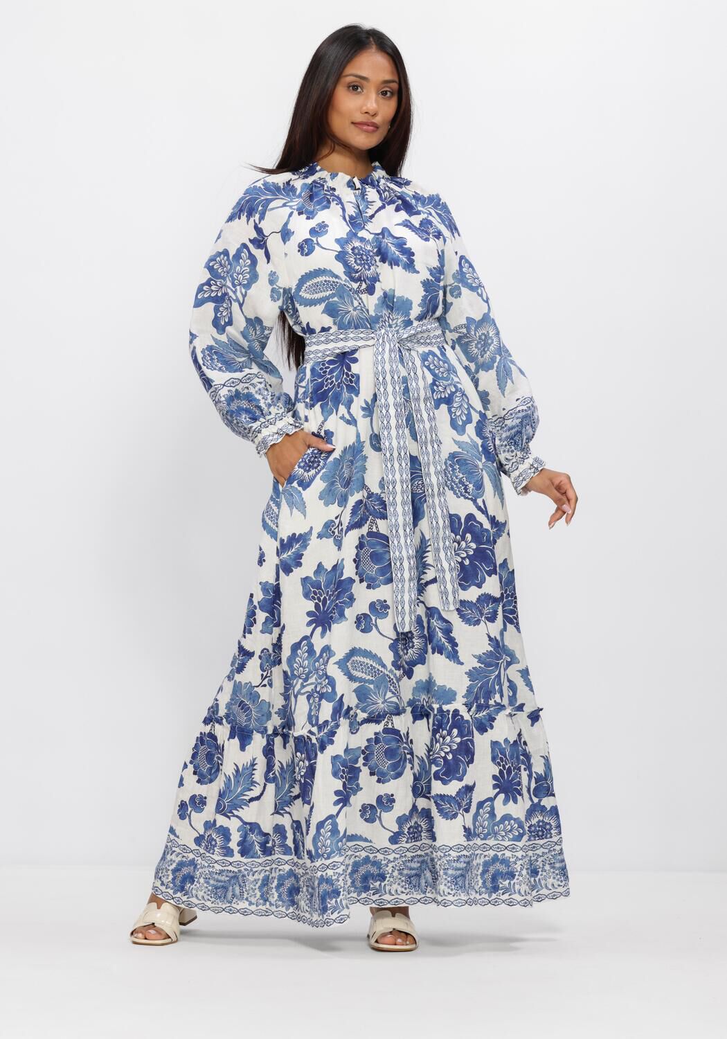 Pink Baby Isadora floral belted maxi dress in blue and white with a flowing design and lightweight fabric.