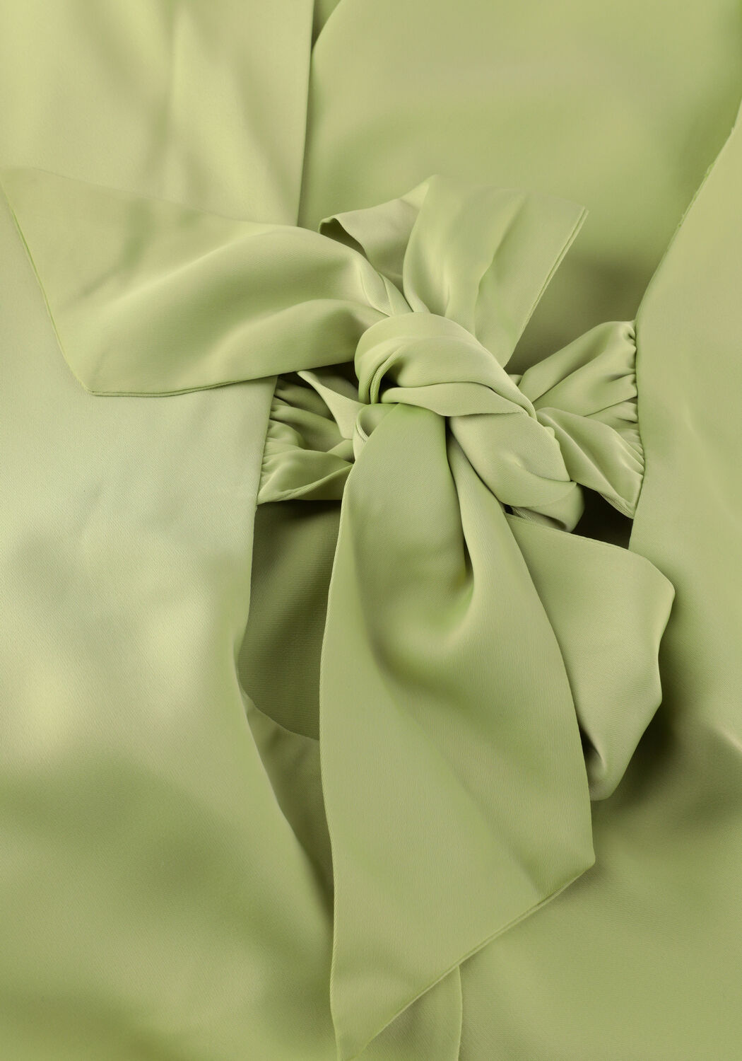 Pink Baby Amalia open-back satin midi dress in sage green, featuring a flowing silhouette and elegant design.