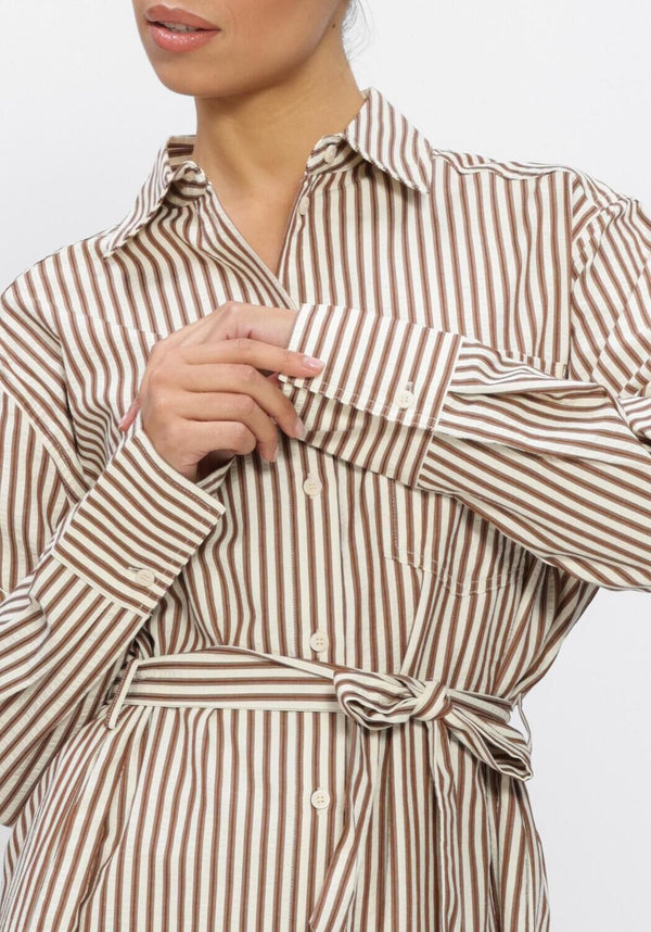 Pink Baby Judy striped belted shirt dress in beige and brown, featuring a classic collar and long sleeves.