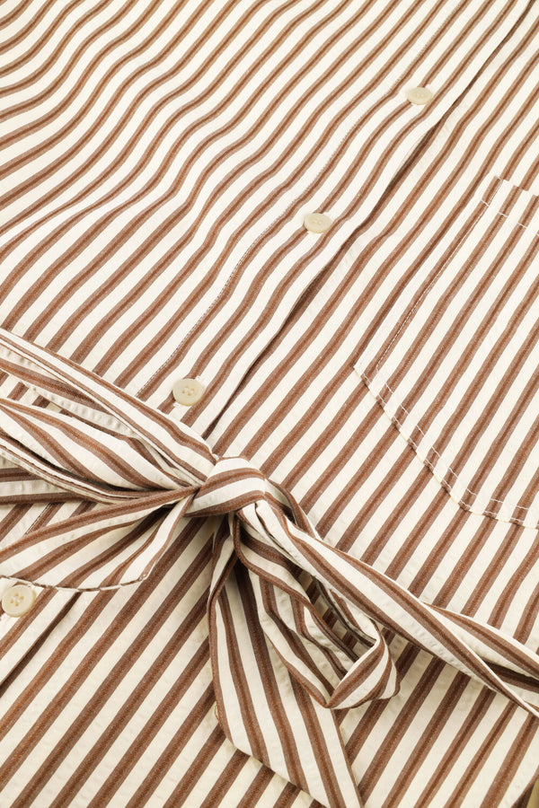 Pink Baby Judy striped belted shirt dress in beige and brown, featuring a button-up front and waist tie for a casual, stylish look.