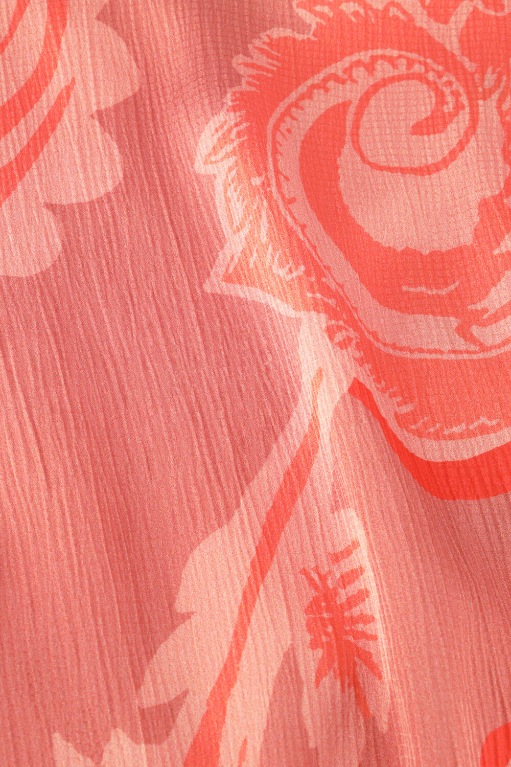 Pink Baby Rosalind floral print maxi dress in coral pink, featuring a flowing design and vibrant flower pattern.
