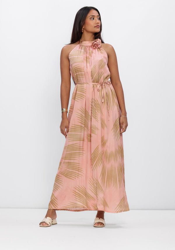 Pink Baby Samanta floral halter maxi dress in blush color with a flowy design and floral pattern on the fabric.
