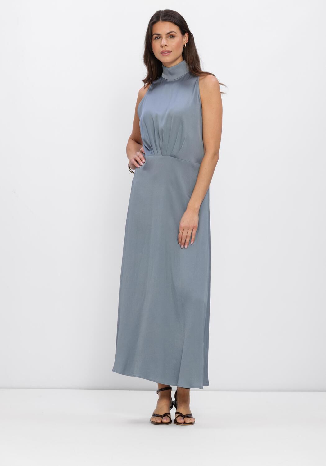 Pink Baby Celest Draped High-Neck Maxi Dress in Dusty Blue with flowing fabric and elegant high neckline.