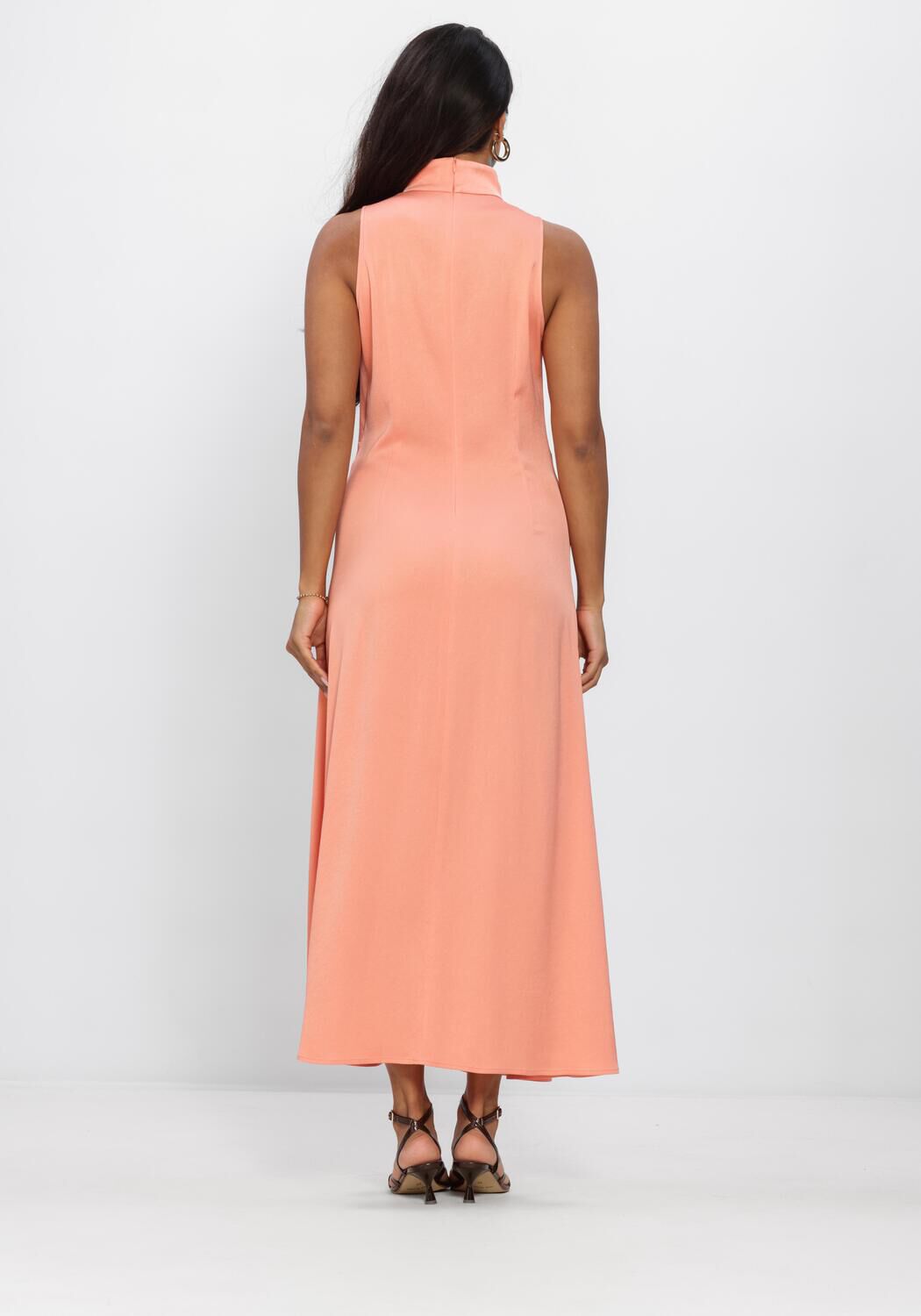 Pink Baby Sera Draped High-Neck Peach Maxi Dress displayed on a hanger with flowing fabric and elegant high neckline.