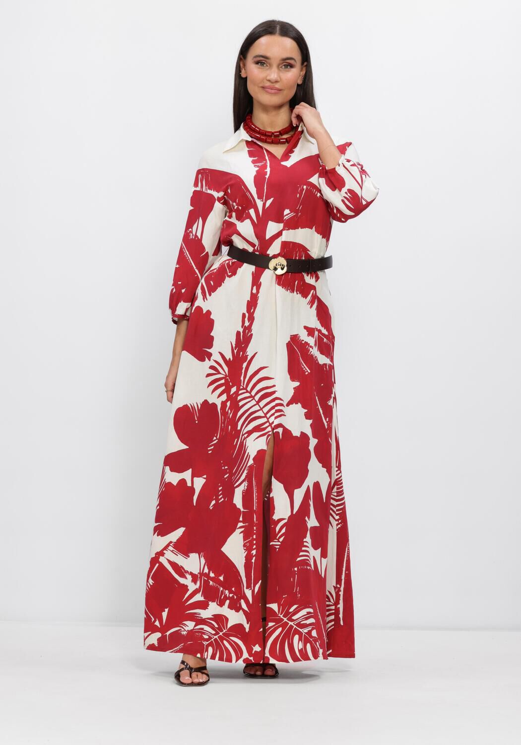 Pink Baby Marcia tropical print maxi dress in red and white, featuring a flowy design and vibrant floral pattern.