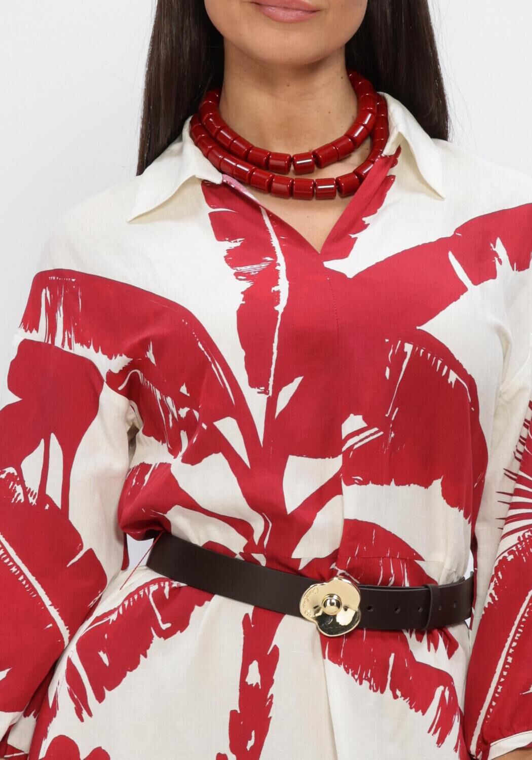 Pink Baby Marcia tropical print maxi dress in red and white, flowing fabric with vibrant tropical floral pattern.