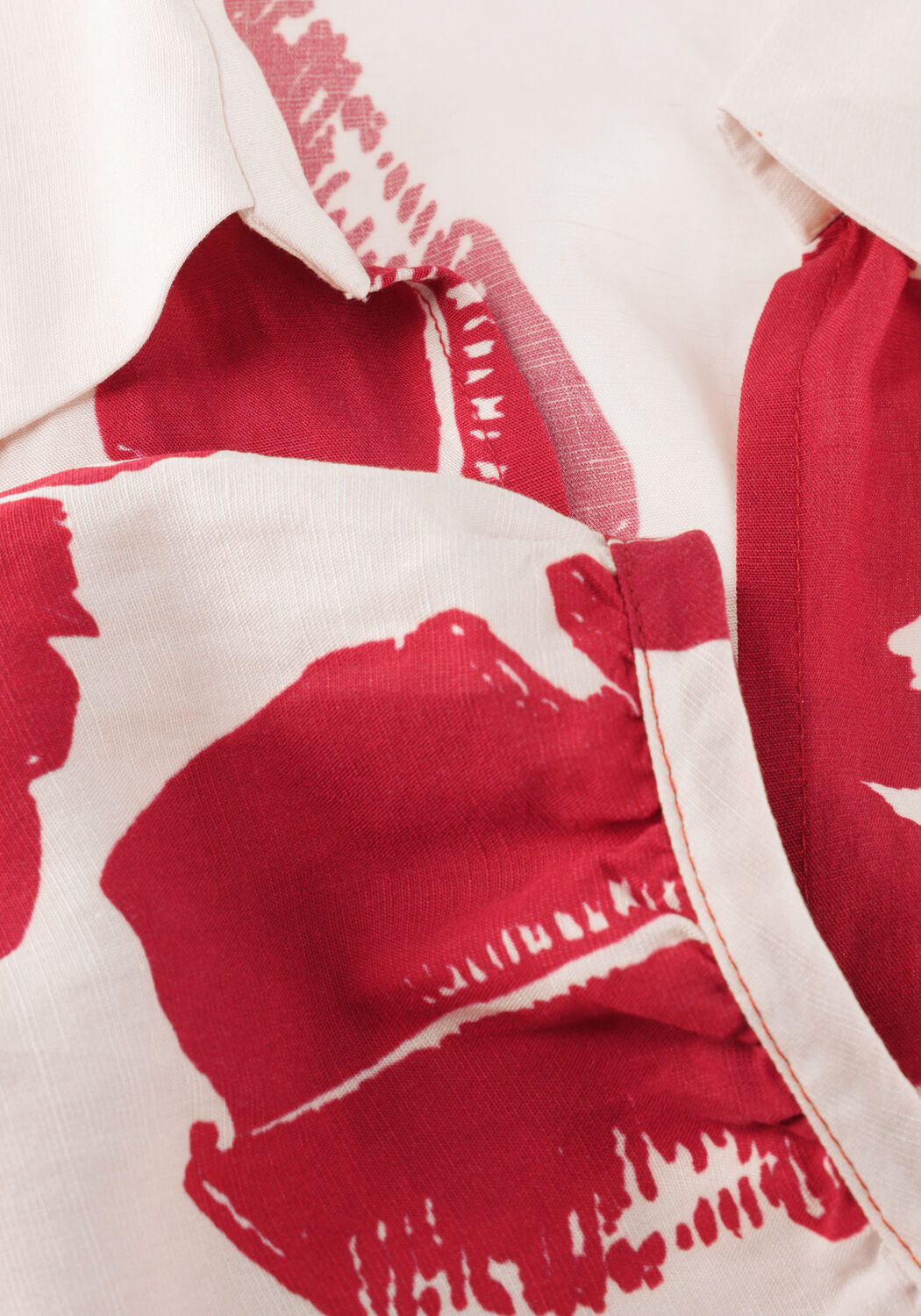 Pink Baby Marcia tropical print maxi dress in red and white, flowing design with vibrant floral pattern for summer wear.