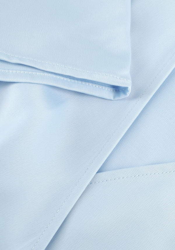 Pink Baby Livina Ruffle-Hem Wrap Midi Dress in powder blue, featuring a ruffled hem and elegant wrap design.