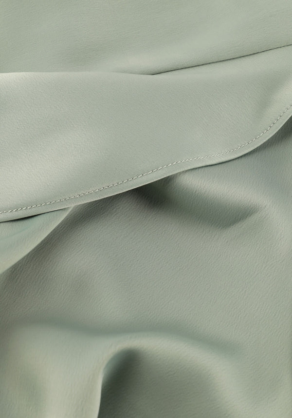Pink Baby Emelyn satin wrap midi dress in sage green, featuring a stylish V-neck and elegant midi length.