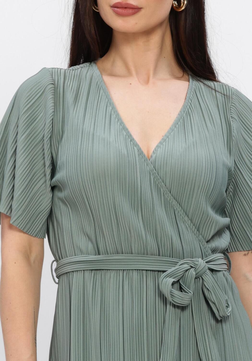 Pink Baby Aveline pleated wrap midi dress in sage green, featuring a stylish design and flowy fabric.
