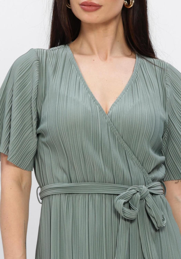 Pink Baby Aveline pleated wrap midi dress in sage green, featuring a stylish design and flowy fabric.