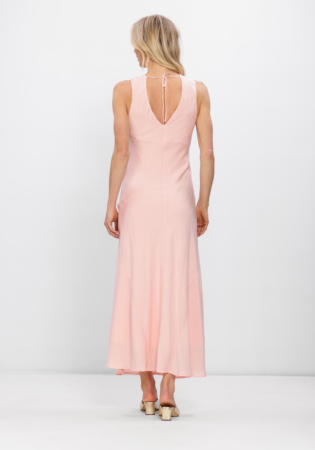 Pink Baby Eliana Draped Satin Maxi Dress in blush pink, flowing fabric and elegant design perfect for formal occasions.