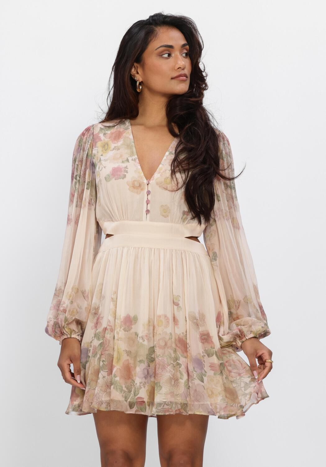 Pink Baby Elodie floral cut-out mini dress in blush ivory, featuring a delicate floral pattern and stylish cut-out details.