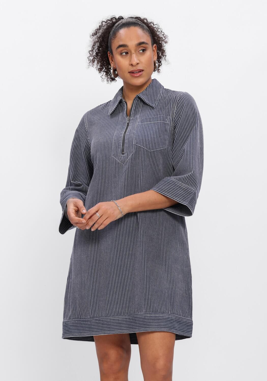 Pink Baby Viana zip-collar striped mini dress in charcoal grey, featuring a stylish zip collar and bold stripe pattern.