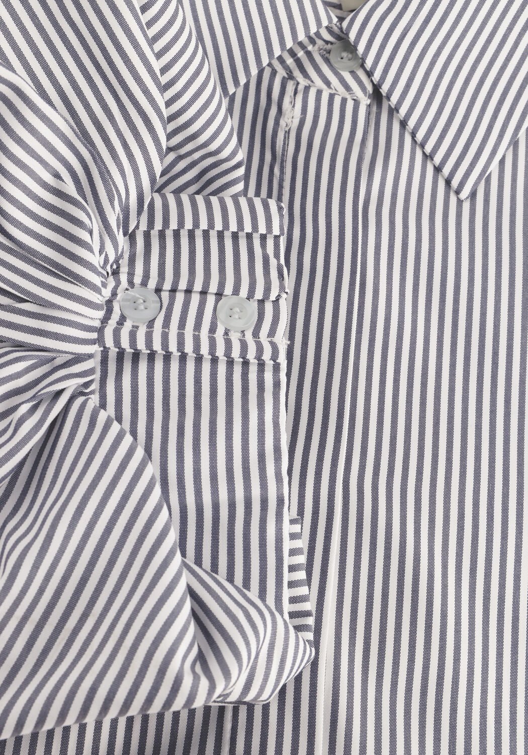 Pink Baby Adelina striped puff-sleeve shirt dress in white and black, featuring a stylish, casual design with puffed sleeves.