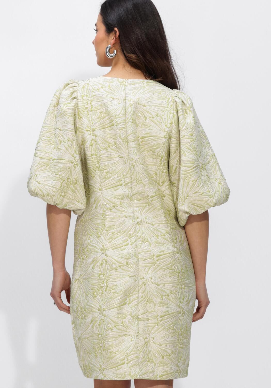 Pink Baby Cecilia textured puff sleeve mini dress in sage green, showcasing its stylish puff sleeves and textured fabric.
