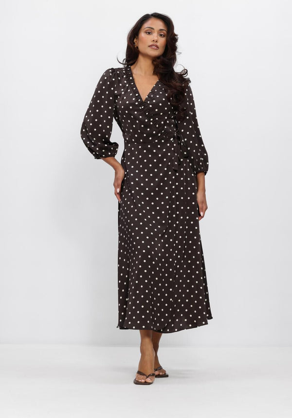 Pink Baby Vivi polka dot wrap midi dress in chocolate brown, featuring a fitted waist and flowing skirt, perfect for stylish occasions.