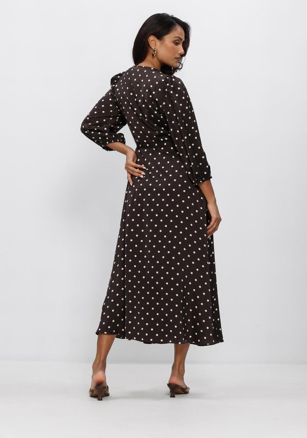 Pink Baby Vivi polka dot wrap midi dress in chocolate brown, featuring a stylish wrap design and midi length.