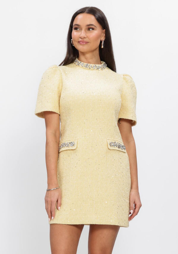 Pink Baby Celine embellished yellow tweed mini dress with soft yellow fabric and decorative accents, stylish and fashionable.