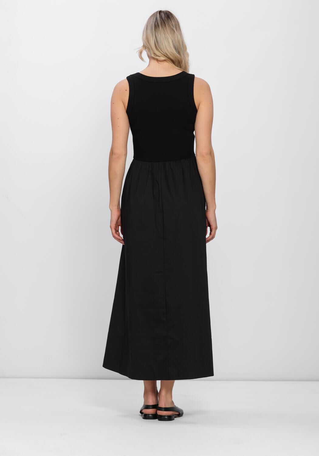 Pink Baby Venice sleeveless drop-waist maxi dress in black, featuring a flowing design and elegant style.