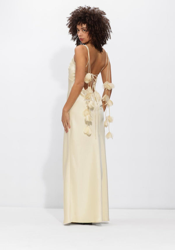 Ivory Elowen open-back satin maxi dress by Pink Baby, featuring a flowing design and elegant open-back detail.