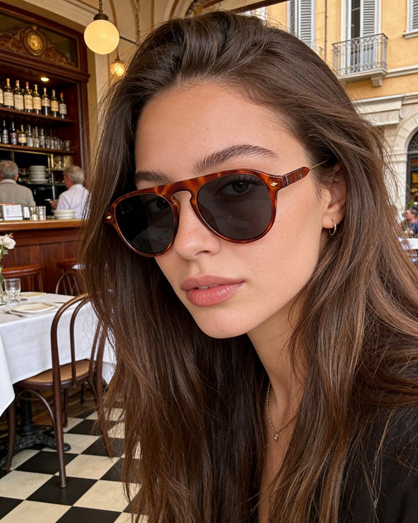 Pink Baby The Riley tort sunglasses with round frames and dark lenses, stylish eyewear for a trendy look.