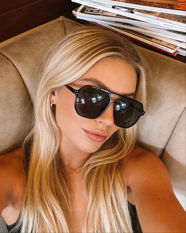 Pink Baby The Blake sunglasses with round frames and tinted lenses, stylish eyewear for a fashionable look