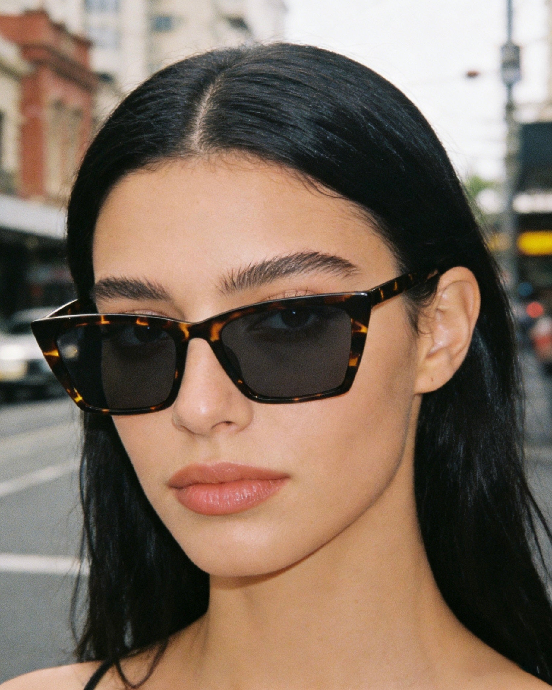 Pink Baby Levi sunglasses with black frames and tinted lenses, stylish and protective eyewear for casual wear.