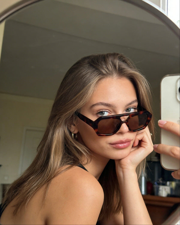 Pink Baby The Orin sunglasses with stylish round frames and tinted lenses, perfect for fashionable sun protection.