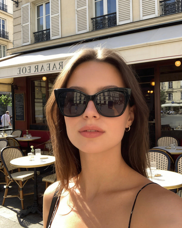 Pink Baby Rylee black sunglasses with stylish, modern frames and tinted lenses for sun protection.